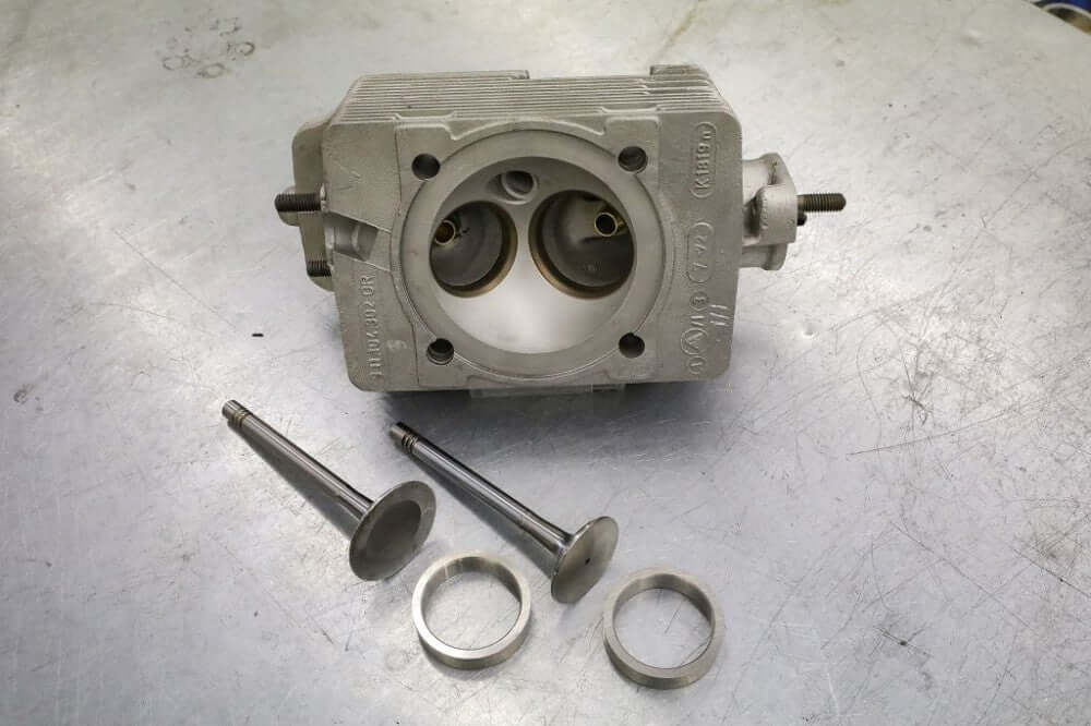 Replace cylinder head valve seat ring - per piece