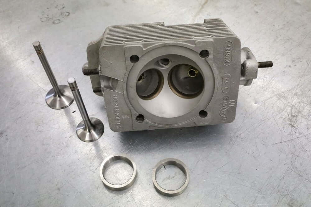 Replace cylinder head valve seat ring - per piece