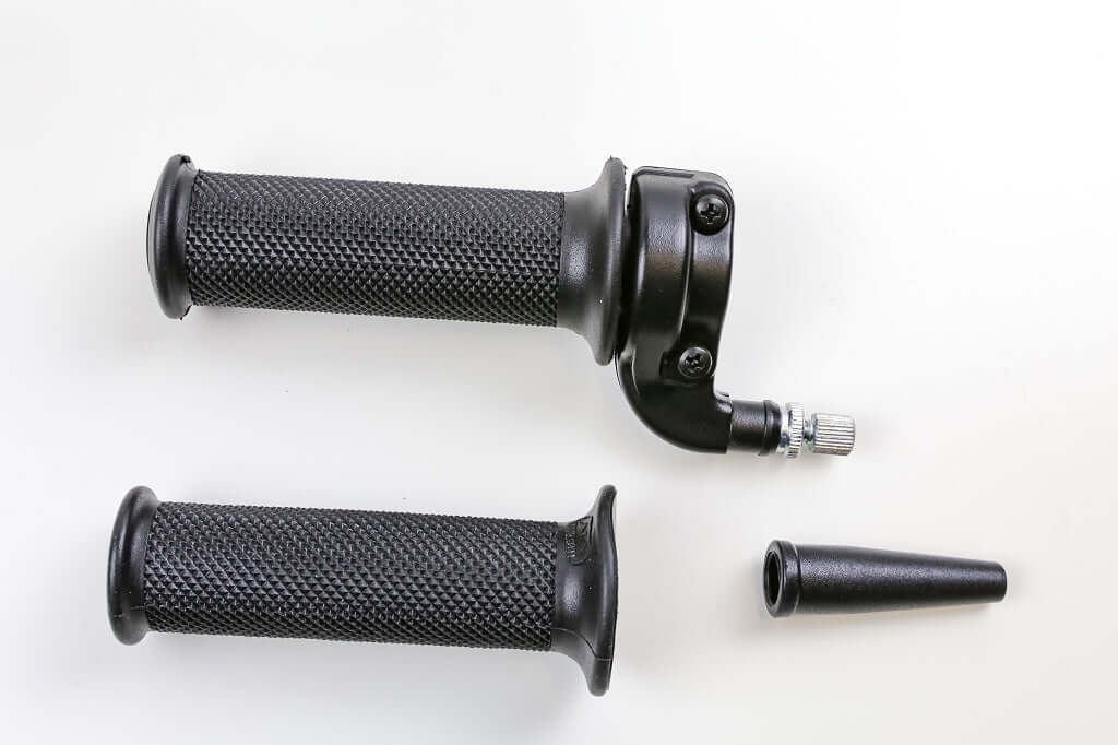 Motorcycle throttle grip with adjuster for a single cable